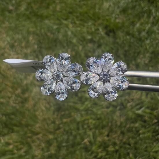 Close-up earrings photo held in tweezers - 4 CTW Pear-Shaped Lab-Grown Diamond Flower Earrings - 14K White Gold