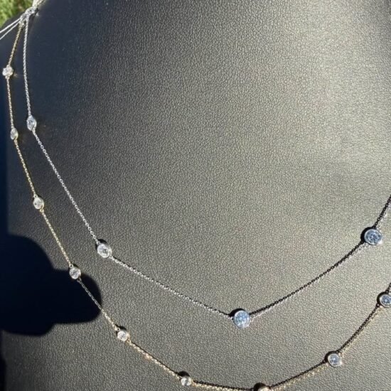 Solid 14K gold diamond by the yard necklace, both necklaces displayed on a black bust, 2.05-2.47 CTW lab-grown diamonds