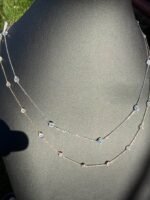 Solid 14K gold diamond by the yard necklace with 2.05-2.47 CTW lab-grown diamonds displayed on a black bust