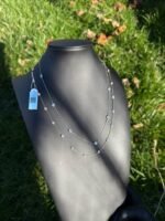 Solid 14K gold diamond by the yard necklace with 2.05-2.47 CTW lab-grown diamonds on a black bust, full view